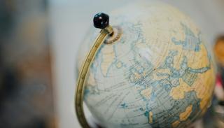 An image of a globe spun towards Europe. 