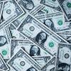 A pile of US currency notes